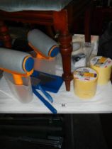 A mixed lot including paint rollers, tape etc.,