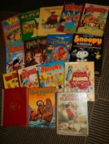 A quantity of children's annuals including Rupert.