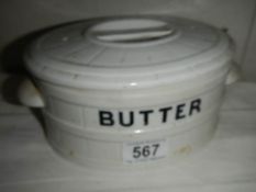 A ceramic butter dish.