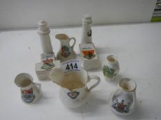Nine pieces of crested china.