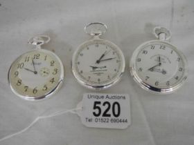 Three modern pocket watches.