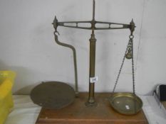 A set of Victorian brass balance scales.