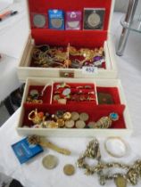 A jewellery box and costume jewellery.