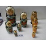 Two sets of Russian nesting dolls.