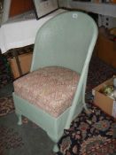 A mid 20th century Lloyd Loom style bedroom chair. COLLECT ONLY.