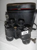 A cased set of Zenith 10 x 50 binoculars.