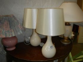 A pair of table lamps and two others.
