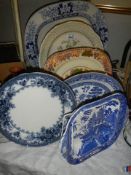 A quantity of blue and white plates etc.,