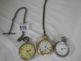 Three old pocket watches.