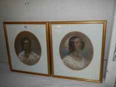 A pair of framed and glazed oval portraits of the Misses Makenzie of Seaforth, circa 1850's. COLLECT