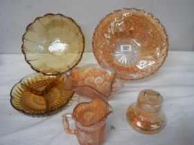 Six pieces of carnival glass.