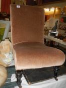 An Edwardian beige upholstered nursing chair, COLLECT ONLY.