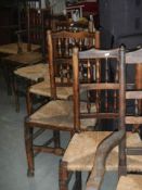 A set of oak chairs with Raffia seats COLLECT ONLY.