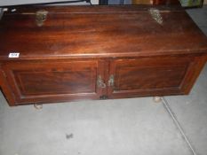 A mahogany two door chest. COLLECT ONLY.