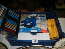 A Hilka 400w jigsaw with blades, COLLECT ONLY.