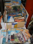 A quantity of Meccano magazines.