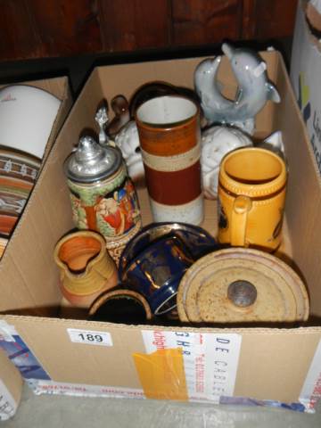 A mixed lot of ceramics including beer stein, tankards etc., COLLECT ONLY.
