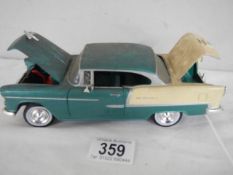 A tin plate 1956 Chevy car, No. 68033
