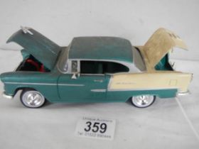 A tin plate 1956 Chevy car, No. 68033