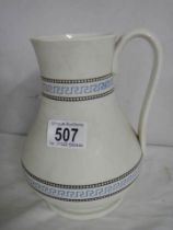 A vintage water jug.