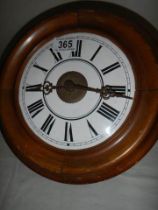 A circular wall clock (No pendulum or weight)