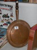 A copper warming pan, COLLECT ONLY.