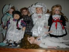 A quantity of collectors dolls.