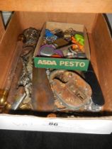 A mixed lot of old keys, padlock, shoe horns etc.,