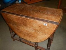 An oak gateleg table, COLLECT ONLY.