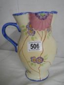 A hand painted Staffordshire jug.