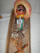 An old Mexican man string puppet.