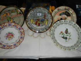 7 assorted collector's plates & 6 porcelain napkin rings