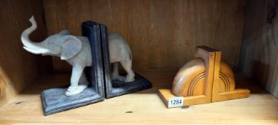 A set of elephant bookends & 1 other