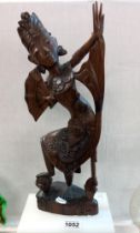 An Oriental carved wooden figure of a geisha height 42m