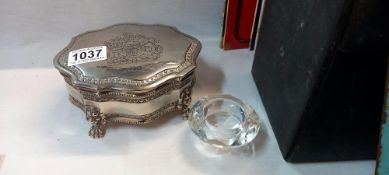 A polished White metal jewellery box engraved with Royal coat of arms a diamond glass candle holder