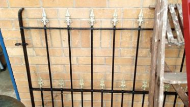 An ornamental set of wrought iron gates