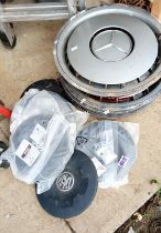 A set of 5 new Vauxhall Vivaro hub caps & 15'' Mercedes trims