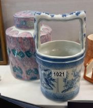 An oriental style lidded storage jar & blue & white bucket