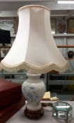 A floral decorative porcelain table lamp COLLECT ONLY
