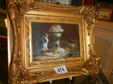 A gilt framed cat scene, COLLECT ONLY.