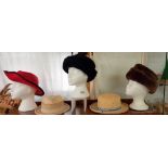 A quantity of vintage hats