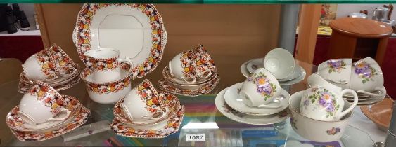 A vintage 21 piece tea set and an 18 piece tea set