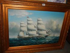 A gilt framed oil on canvas painting of a tall ship in full sail, 118 x 88 cm, COLLECT ONLY.