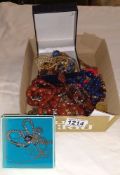 A quantity of costume jewellery including necklaces & brooches
