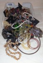 A large quantity of necklaces, bangles etc