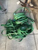 A quantity of garden hoses COLLECT ONLY