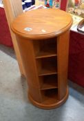 A revolving CD & storage unit Approximately 68cm high COLLECT ONLY