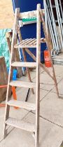 A 4 step pine step ladder