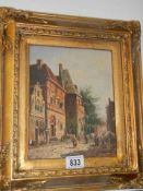 A gilt framed continental street scene signed M Torturg, 38 x 33 cm.