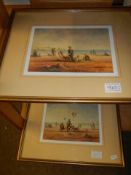 A pair of framed and glazed beach scene prints signed R Cavalla, 33 x 39 cm COLLECT ONLY.